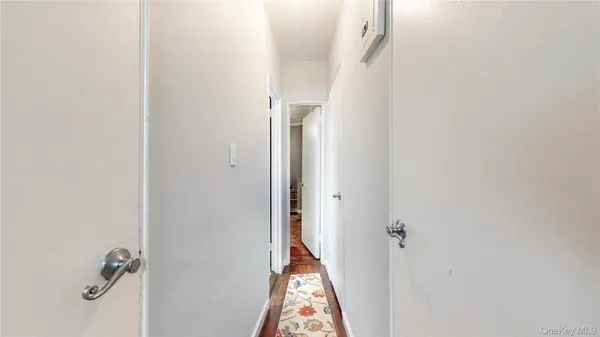 a view of hallway with closet