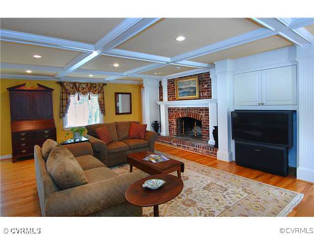 2341 Banstead Road Midlothian, VA 23113 - Photo 3 of 19 a living room with furniture a fireplace and a flat screen tv