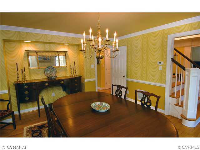 2341 Banstead Road Midlothian, VA 23113 - Photo 4 of 19 a view of a dining room with furniture and chandelier
