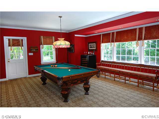2341 Banstead Road Midlothian, VA 23113 - Photo 8 of 19 a room with pool table windows and a chandelier