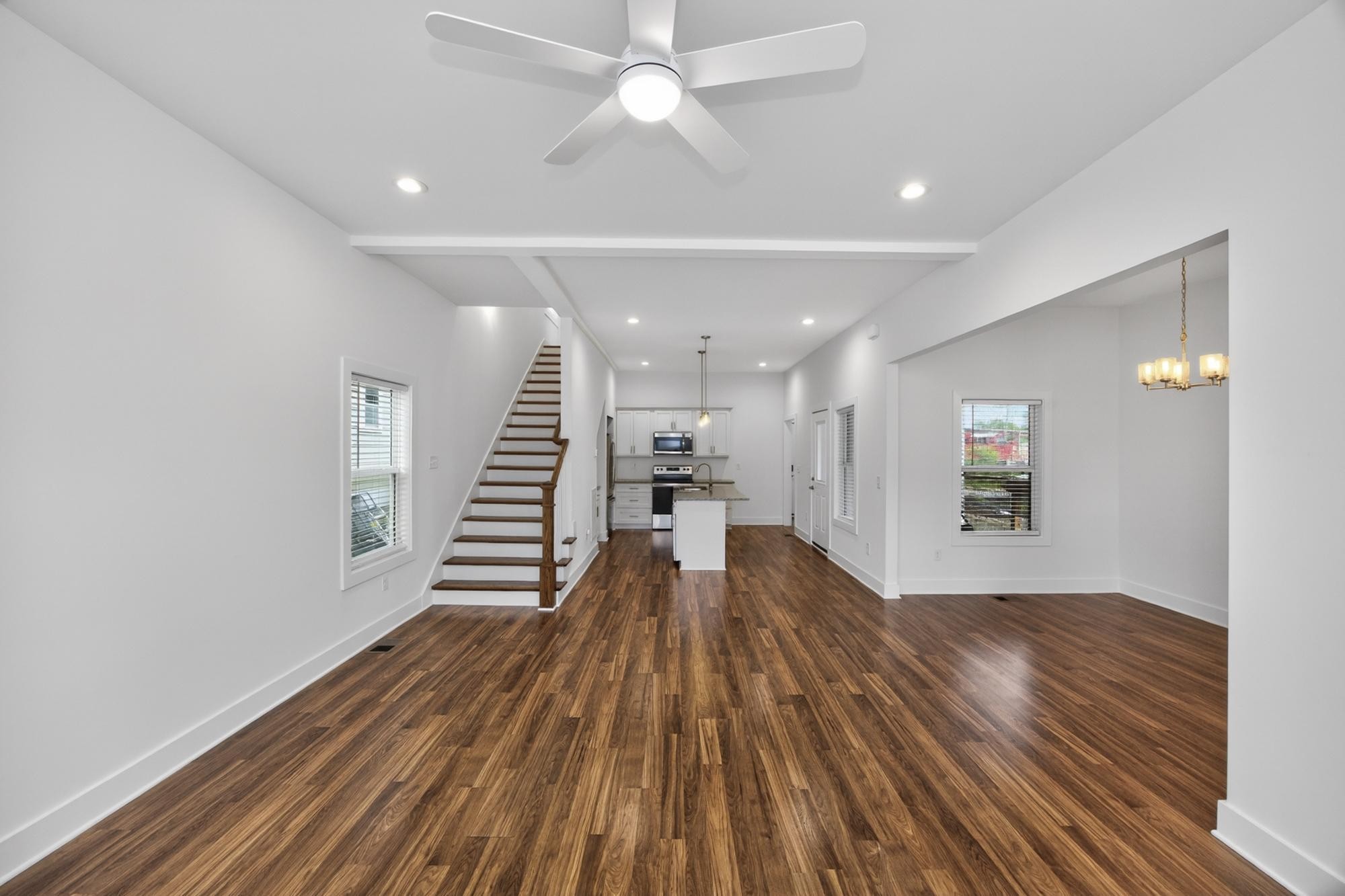 7 Decatur Street Nashville, TN 37210 - Photo 13 of 43 a view of a hallway with wooden floor and staircase