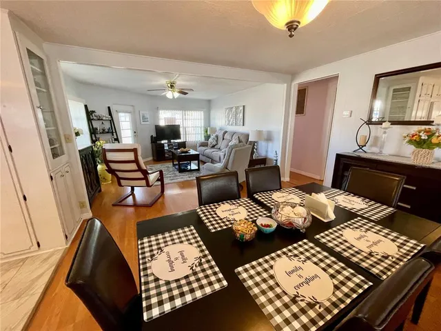 a living room with furniture rug and window