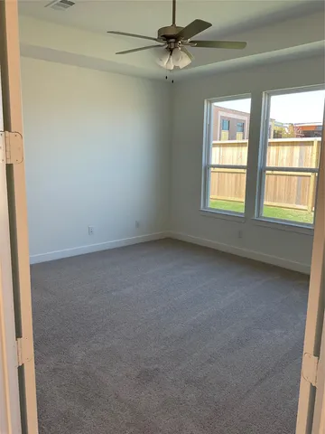 a spacious bathroom with a double vanity sink mirror and bathtub