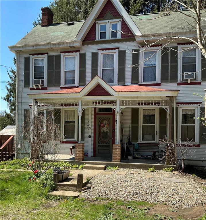118 Saltarka Road Zelienople, PA 16063 - Photo 2 of 49 a front view of a house with garden