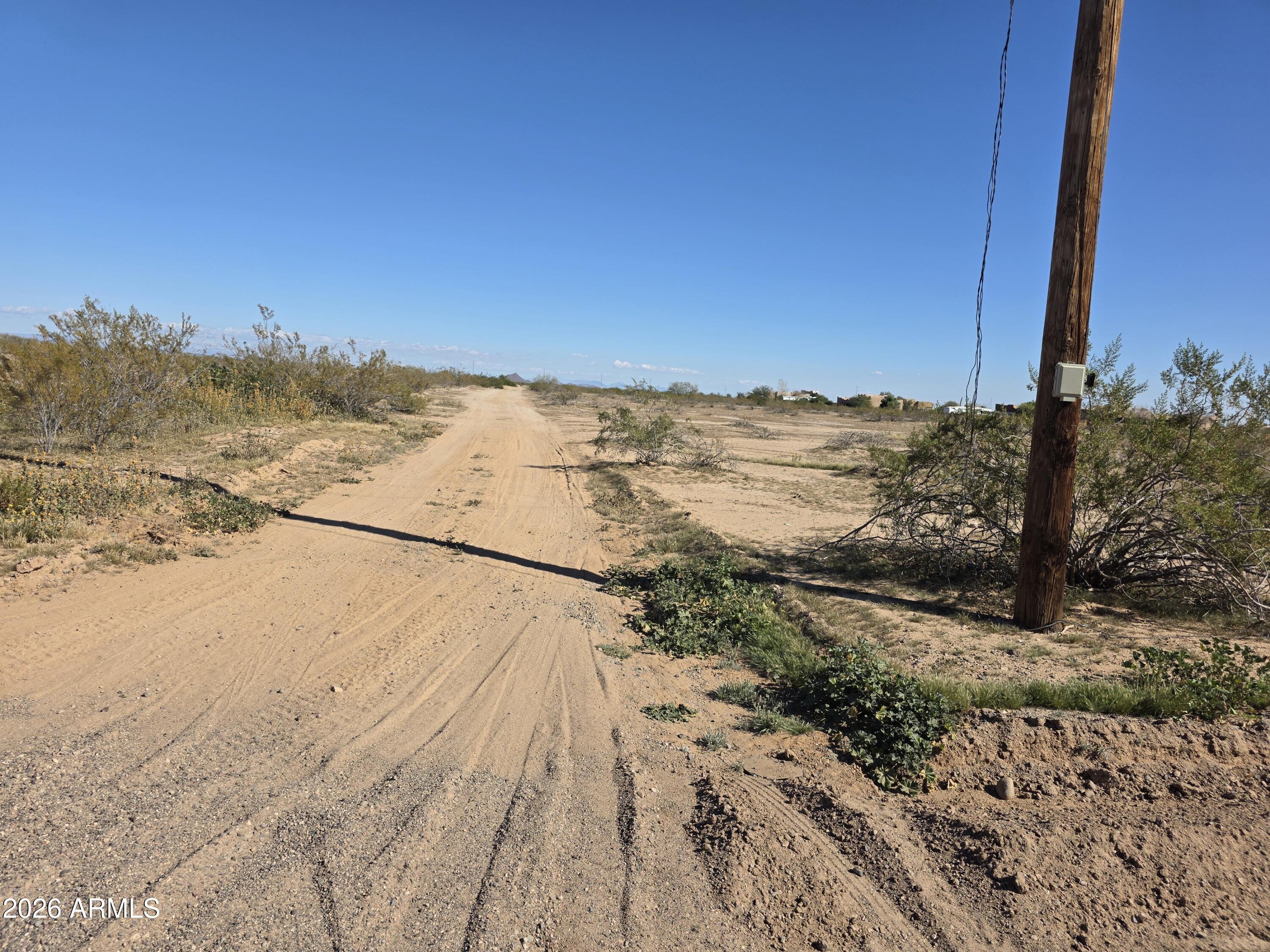 19300 West Roadrunner Road Wittmann, AZ 85361 - Photo 102 of 102 a view of ocean view with large trees