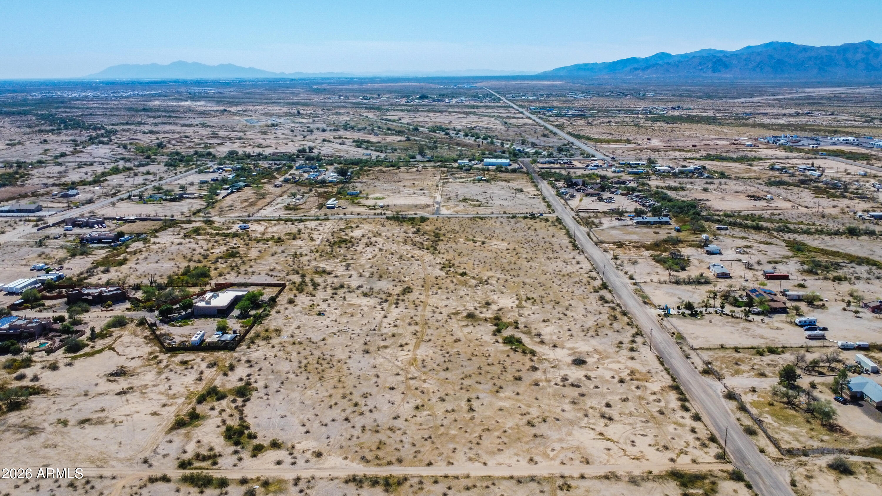 19300 West Roadrunner Road Wittmann, AZ 85361 - Photo 19 of 102 an aerial view of a house with a yard