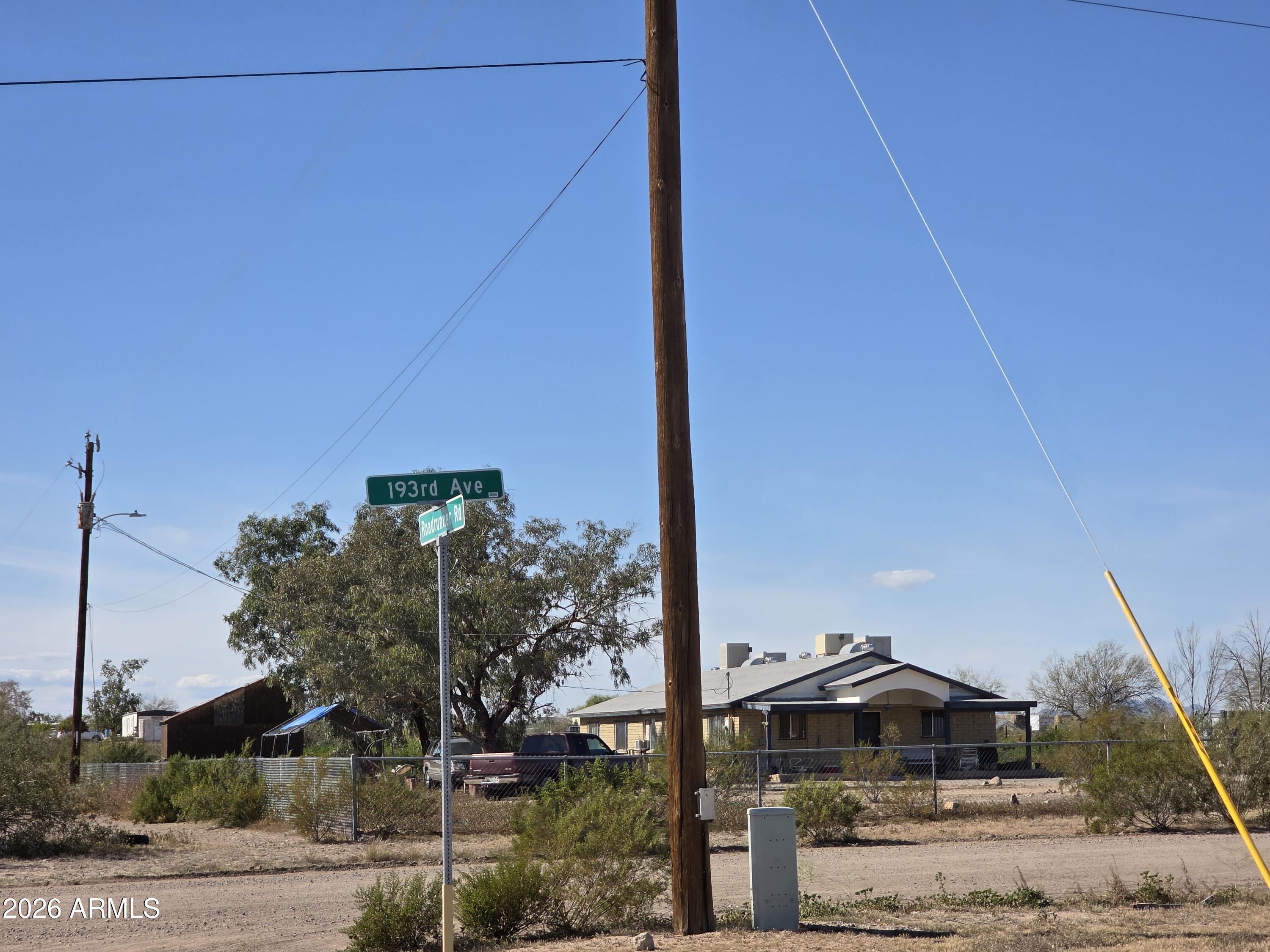 19300 West Roadrunner Road Wittmann, AZ 85361 - Photo 44 of 102 a top view of a house with a yard