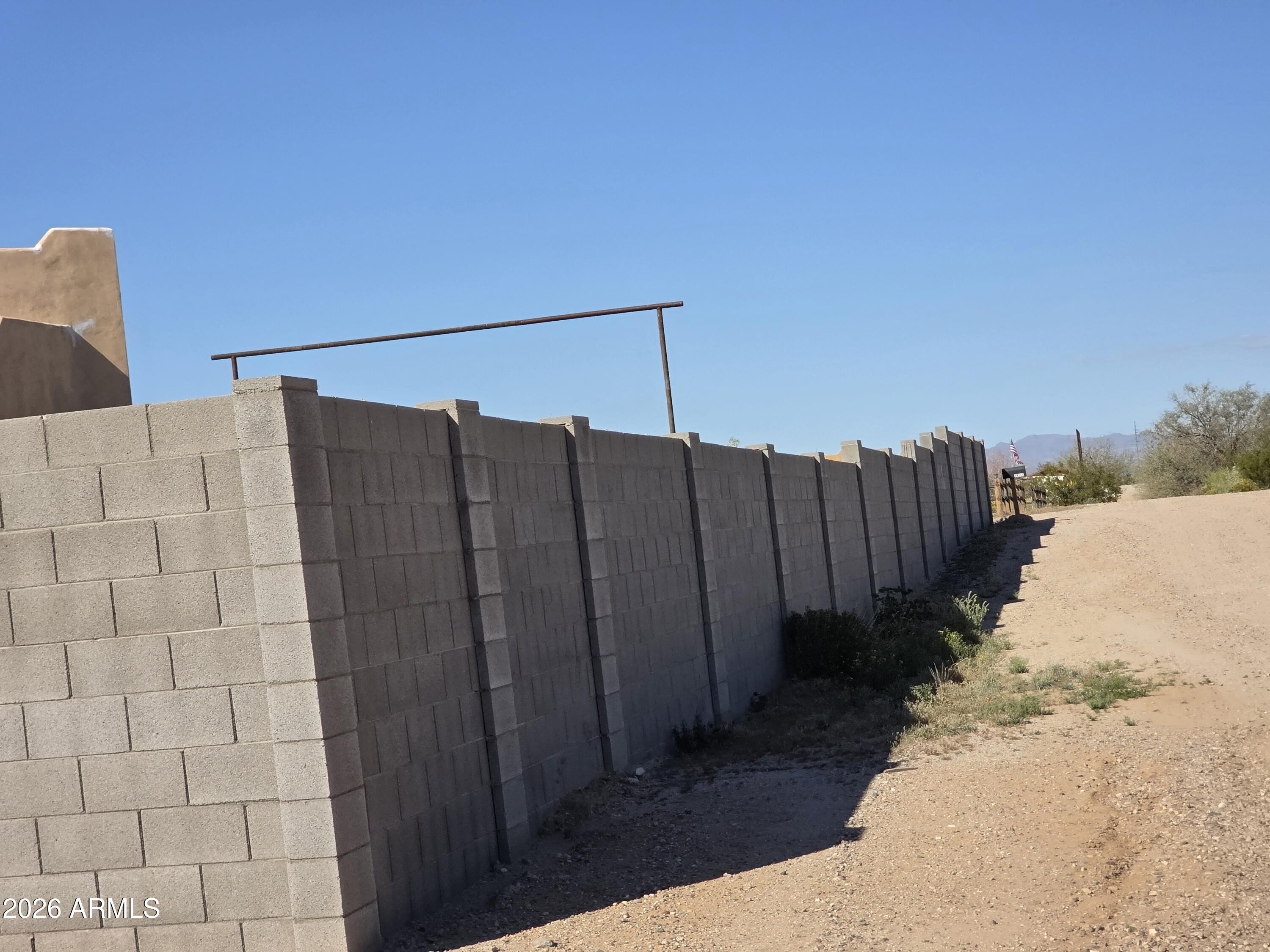 19300 West Roadrunner Road Wittmann, AZ 85361 - Photo 63 of 102 a view of a back yard of the house