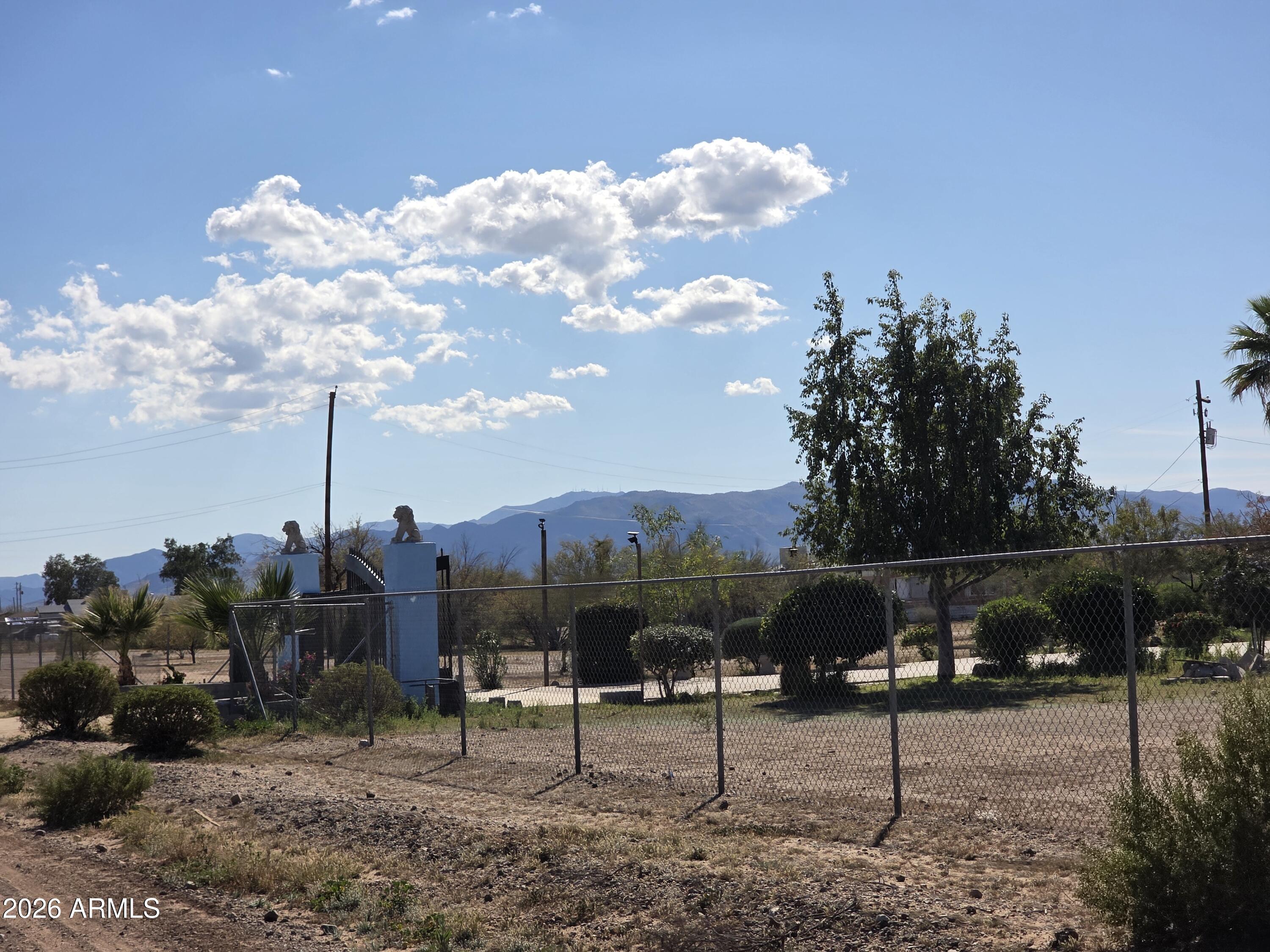19300 West Roadrunner Road Wittmann, AZ 85361 - Photo 67 of 102 a view of a backyard