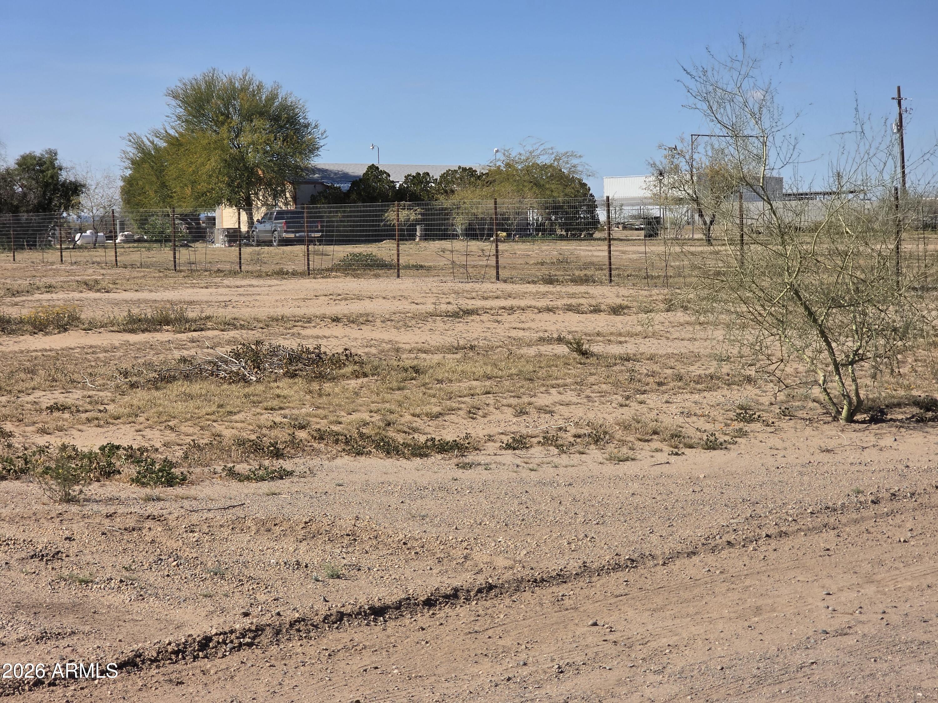 19300 West Roadrunner Road Wittmann, AZ 85361 - Photo 71 of 102 a view of large trees with a yard
