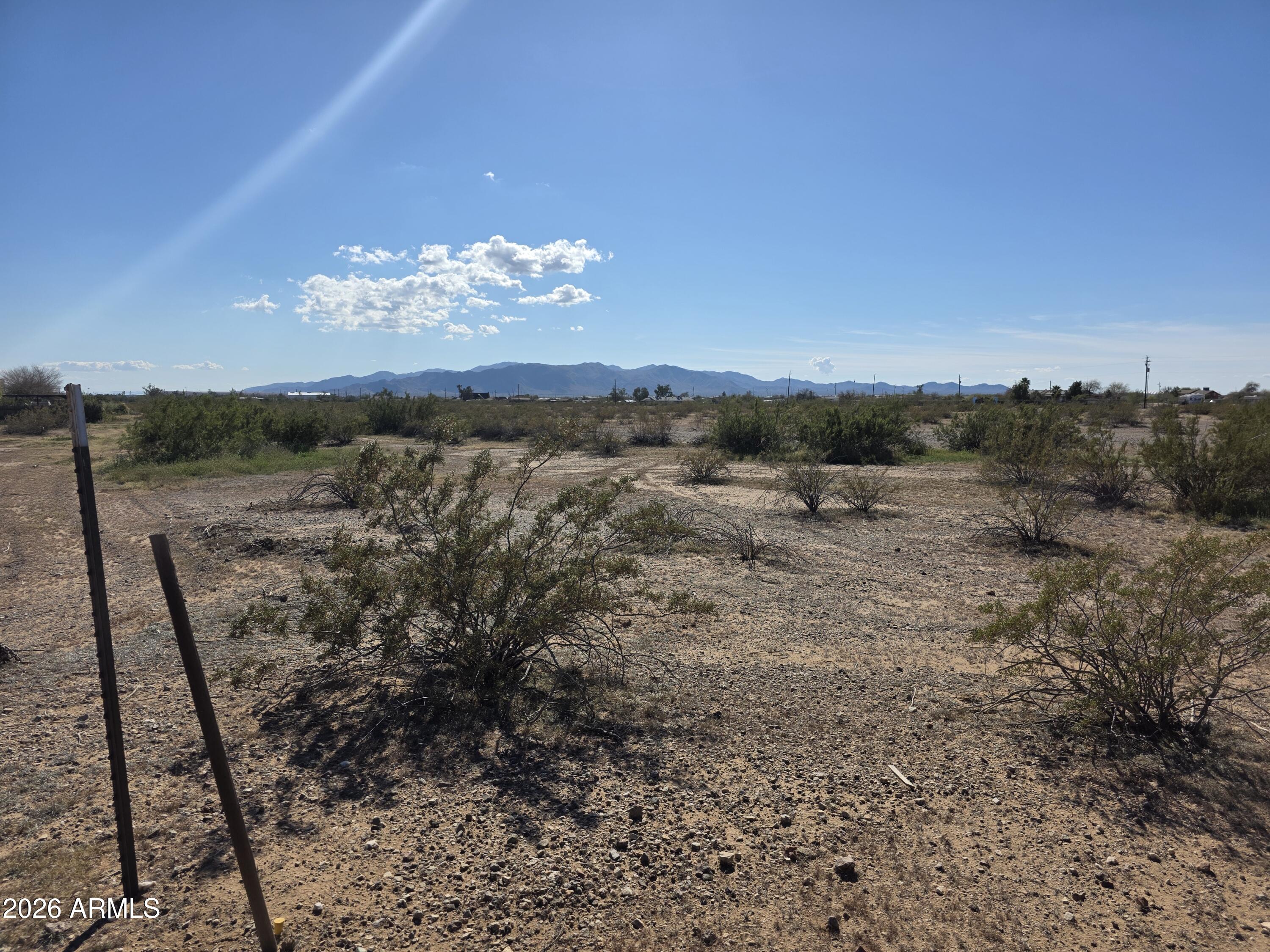 19300 West Roadrunner Road Wittmann, AZ 85361 - Photo 85 of 102 a view of a yard with an outdoor space