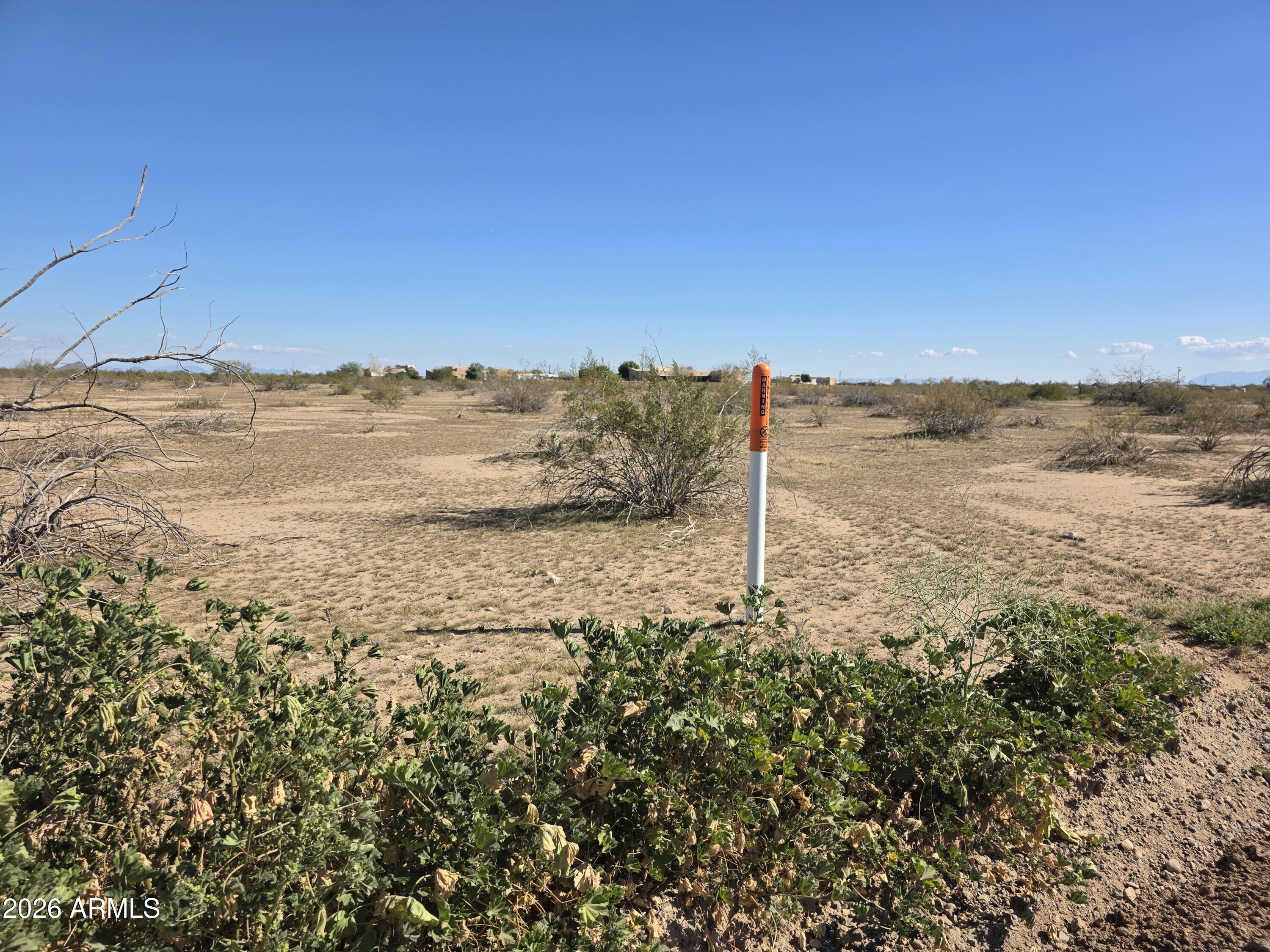 19300 West Roadrunner Road Wittmann, AZ 85361 - Photo 97 of 102 a view of a lake with a mountain