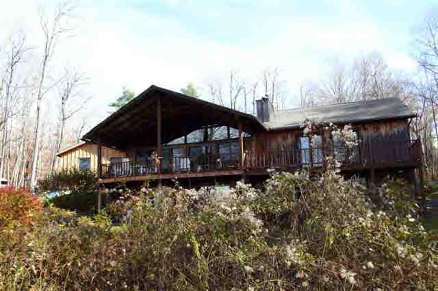 417 Fred Snow Road Becket, MA 01223 - Photo 1 of 10 a view of a house with wooden fence