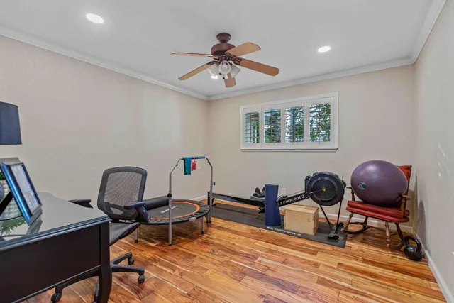 a work room with furniture and a window