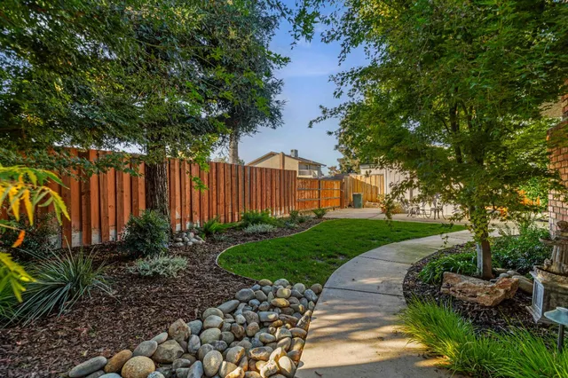 a view of a backyard with green space