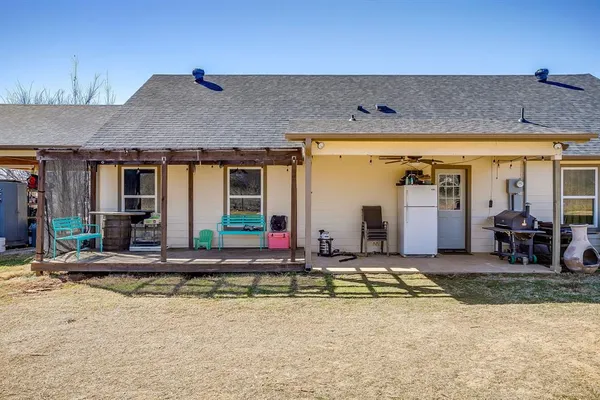 a view of swimming pool with outdoor seating