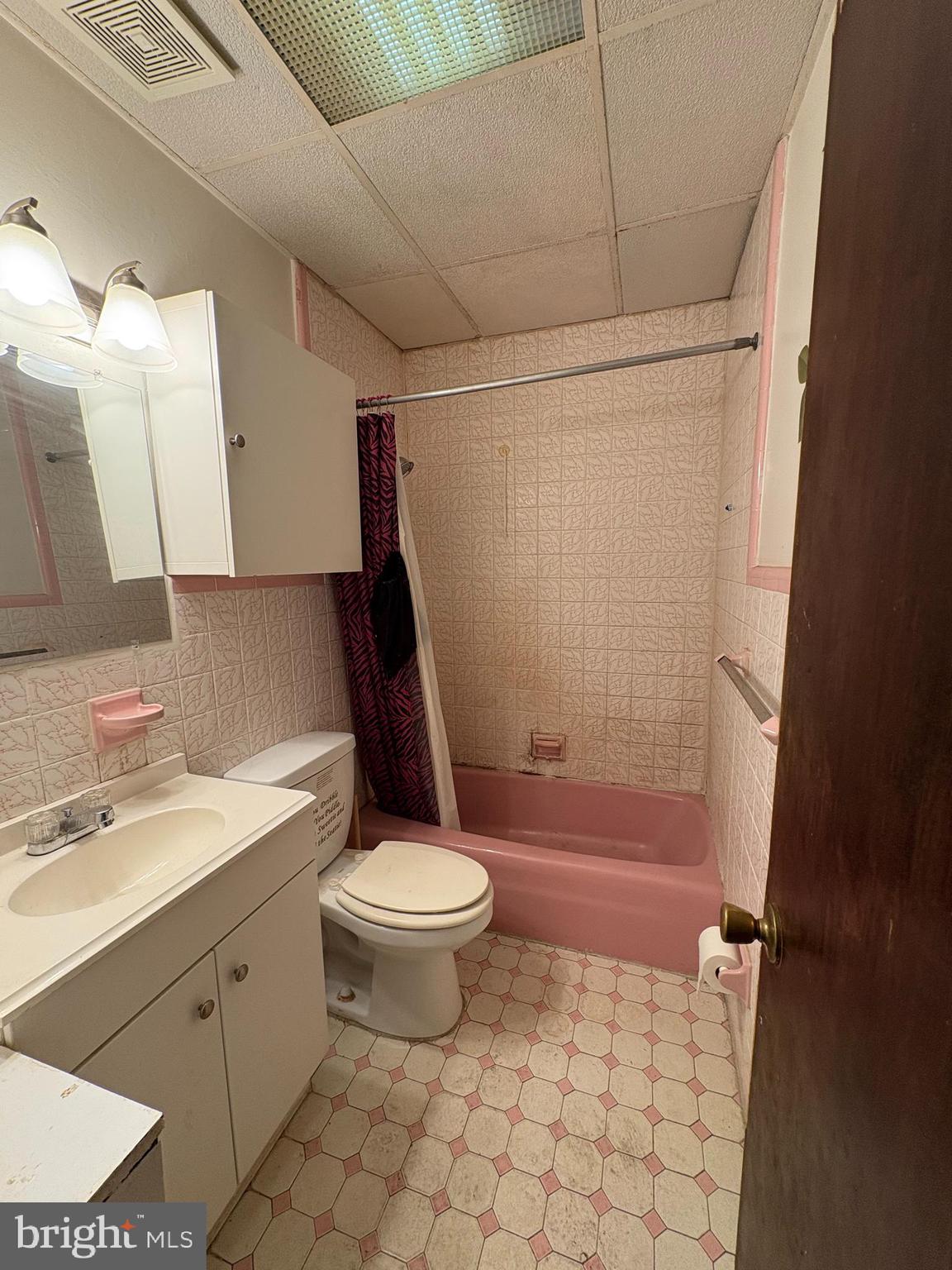 511 North Gross Street Philadelphia, PA 19151 - Photo 8 of 10 a bathroom with a sink a toilet and shower
