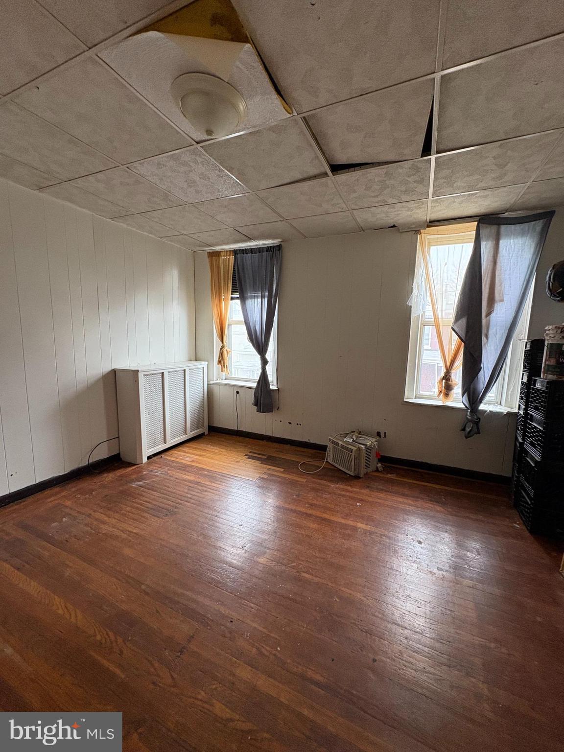 511 North Gross Street Philadelphia, PA 19151 - Photo 9 of 10 an empty room with wooden floor and windows