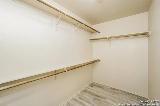 a view of a room with racks on the wall