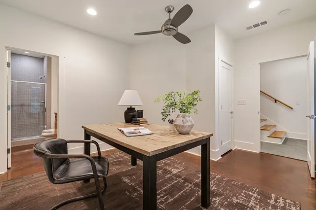 a workspace with furniture and window