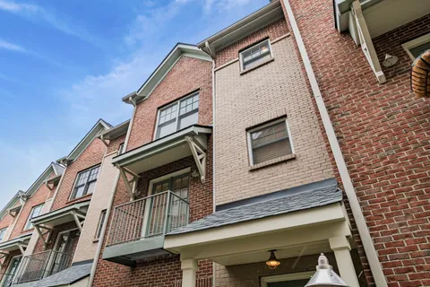 a front view of a house with a porch