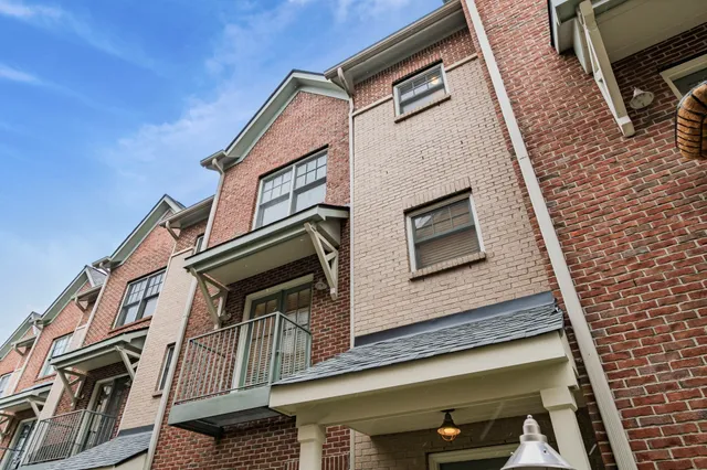 a front view of a house with a porch