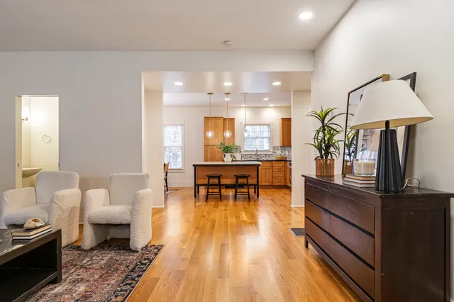 a living room with furniture and a table