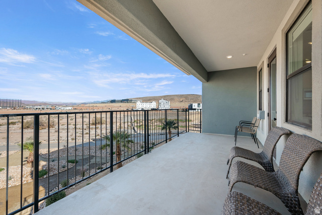 762 West Periwinkle Lane, Unit 102 St. George, UT 84790 - Photo 30 of 40 Balcony with a mountain view