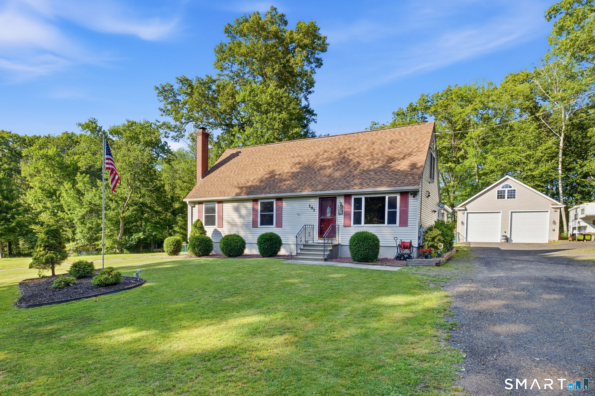 141 Hop River Road Coventry, CT 06238 - Photo 35 of 40 a view of a house with a yard