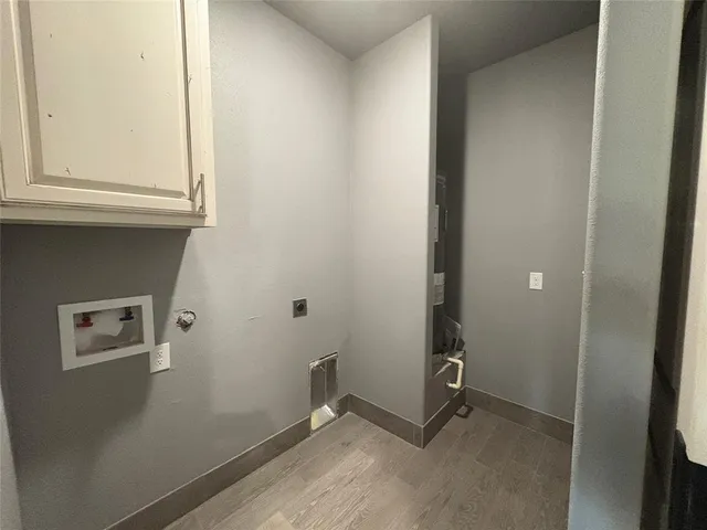 an empty room with mirror