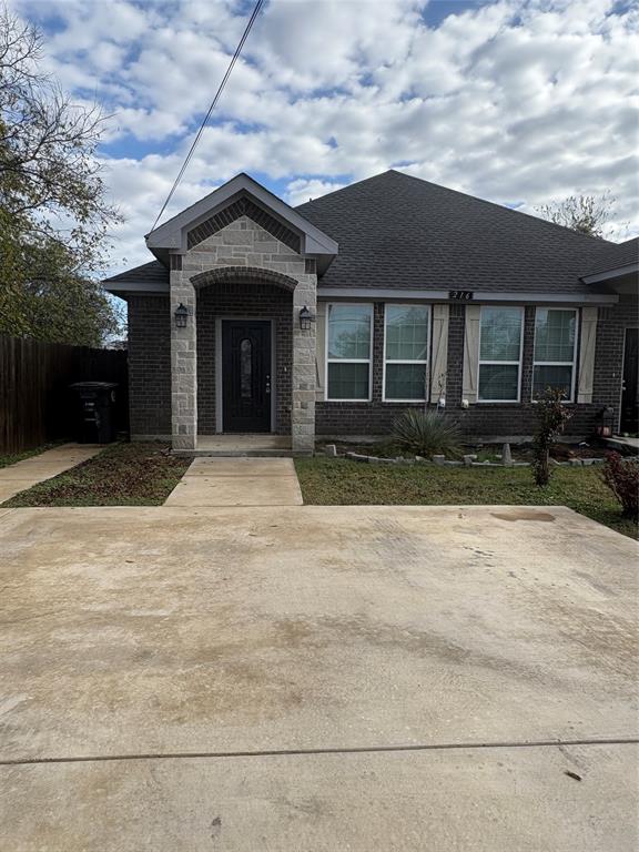 216 Cleveland Street, Unit B Cleburne, TX 76031 - Photo 2 of 26 a front view of a house with yard
