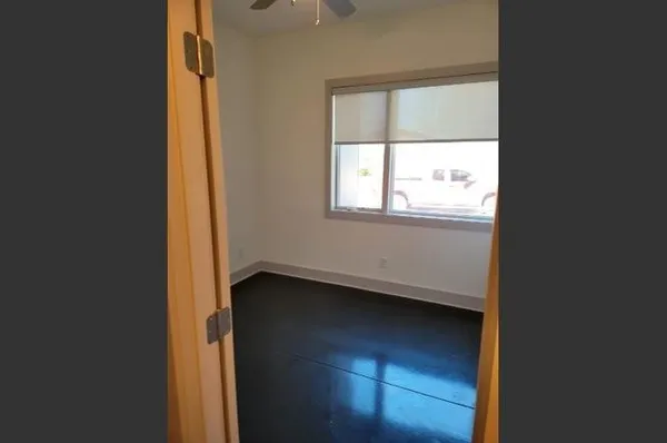 a view of an empty room and window