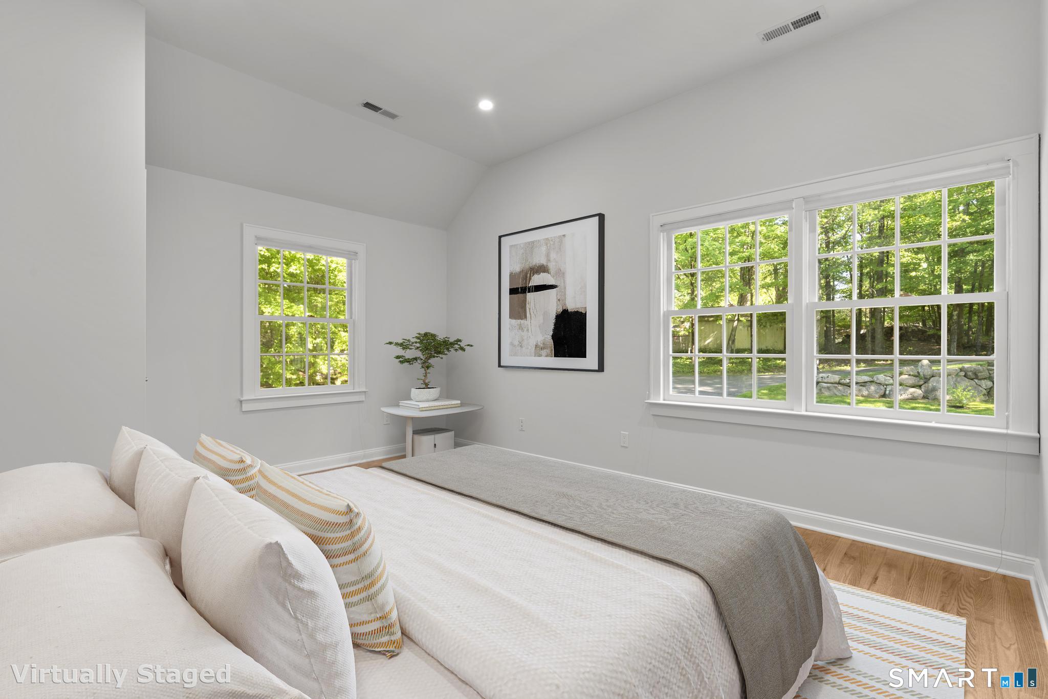 181 Old Branchville Road Ridgefield, CT 06877 - Photo 20 of 40 a bedroom with a bed and a window
