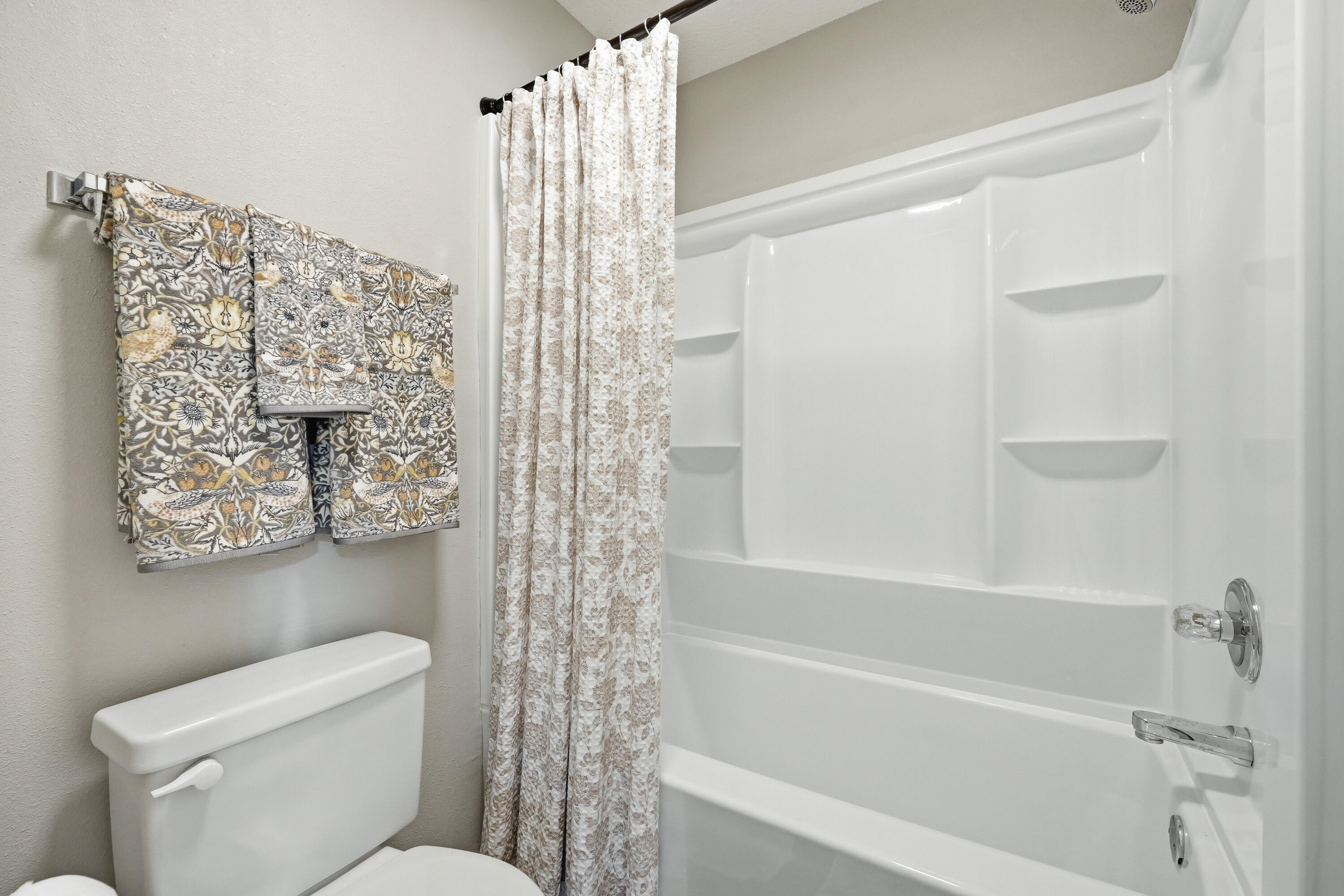 3033 Cabela Lane Crestview, FL 32539 - Photo 19 of 32 a bathroom with a toilet and shower