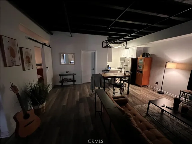 a view of a chairs and table in a patio