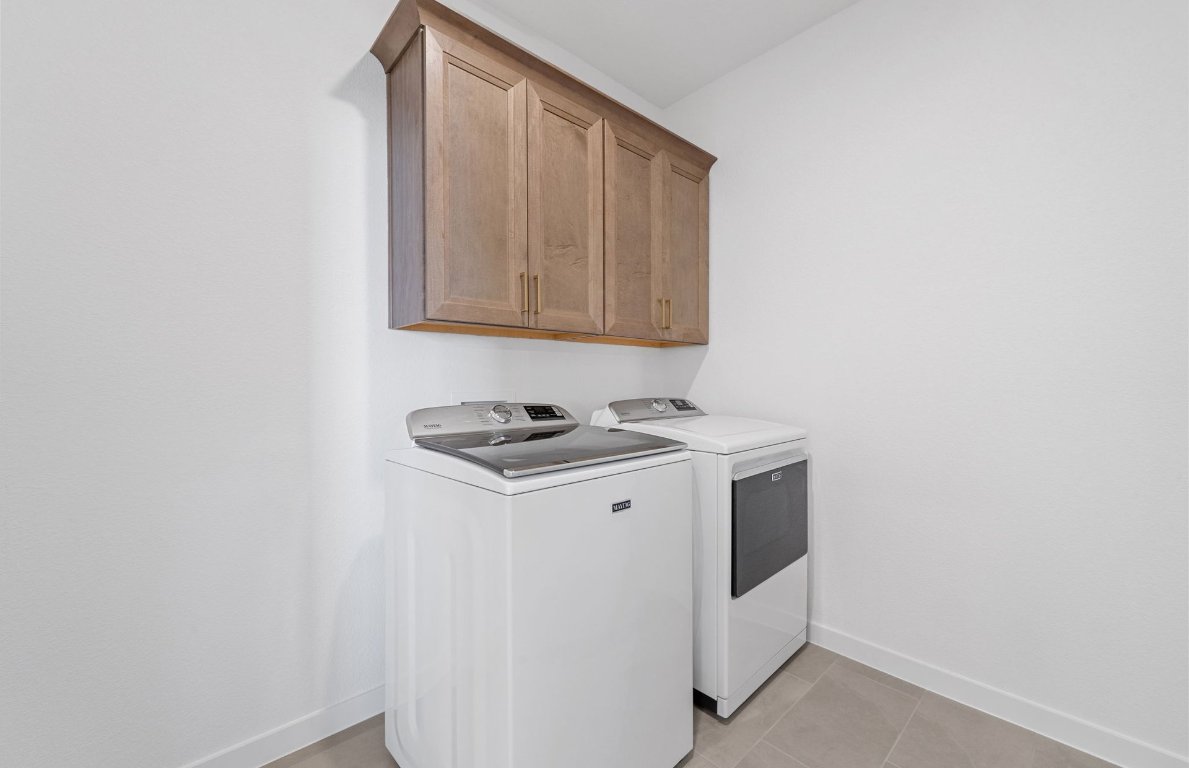 125 Adlai Avenue Georgetown, TX 78633 - Photo 13 of 32 a utility room with dryer and washer