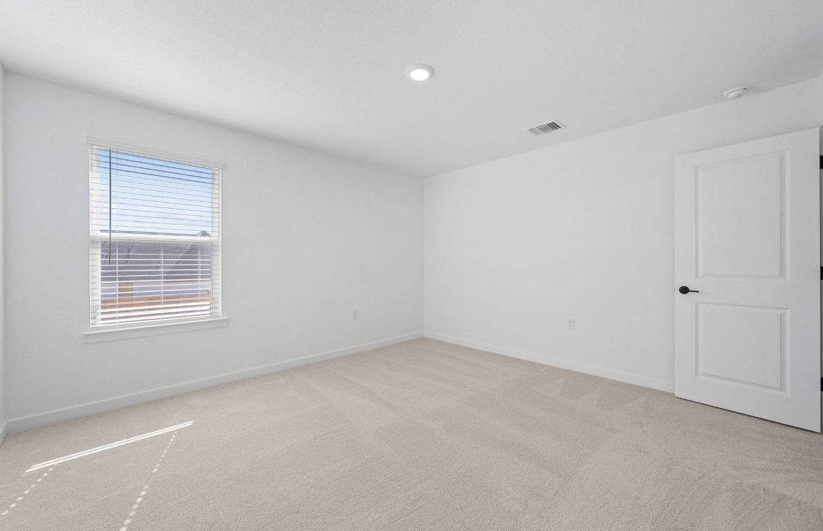 125 Adlai Avenue Georgetown, TX 78633 - Photo 27 of 32 an empty room with a window
