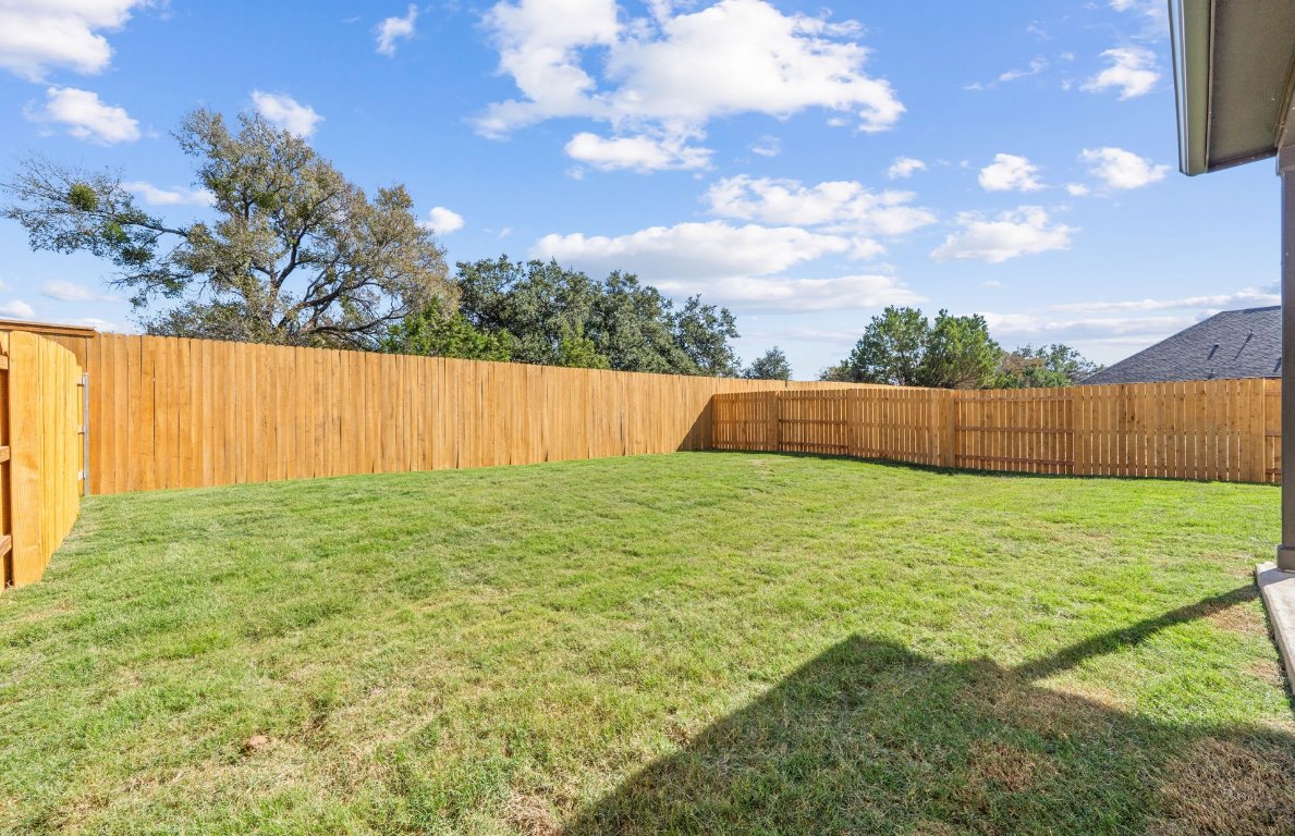 125 Adlai Avenue Georgetown, TX 78633 - Photo 31 of 32 a view of yard with outdoor seating