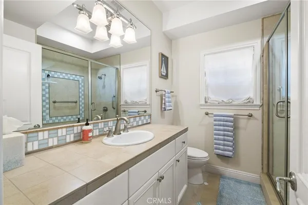 a living room with furniture fireplace and flat screen tv