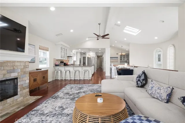 a large kitchen with a table and chairs