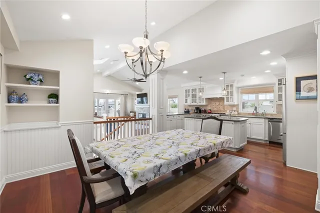 a bathroom with a sink a mirror and a shower