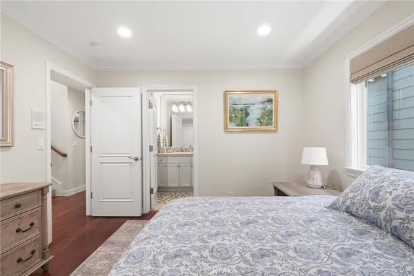 a bathroom with a sink mirror toilet and shower