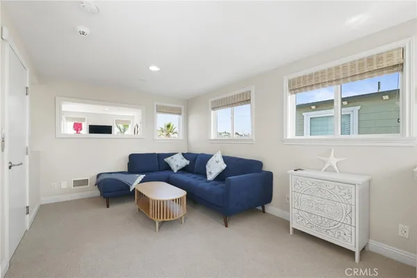 a view of balcony with furniture