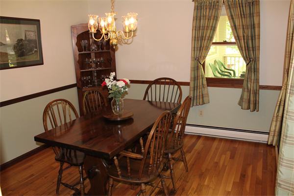 567 Fowler Road Northbridge, MA 01534 - Photo 10 of 22 a view of a dining room with furniture window and outside view