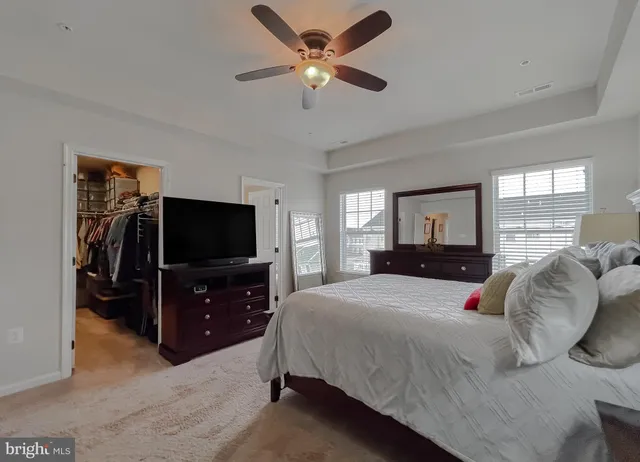 a bath tub sitting next to a window