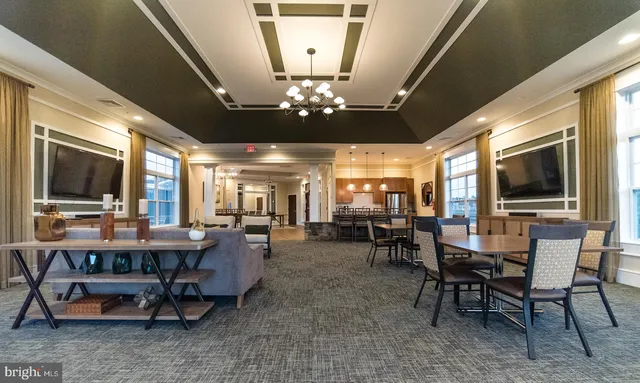 a front view of a building with garden