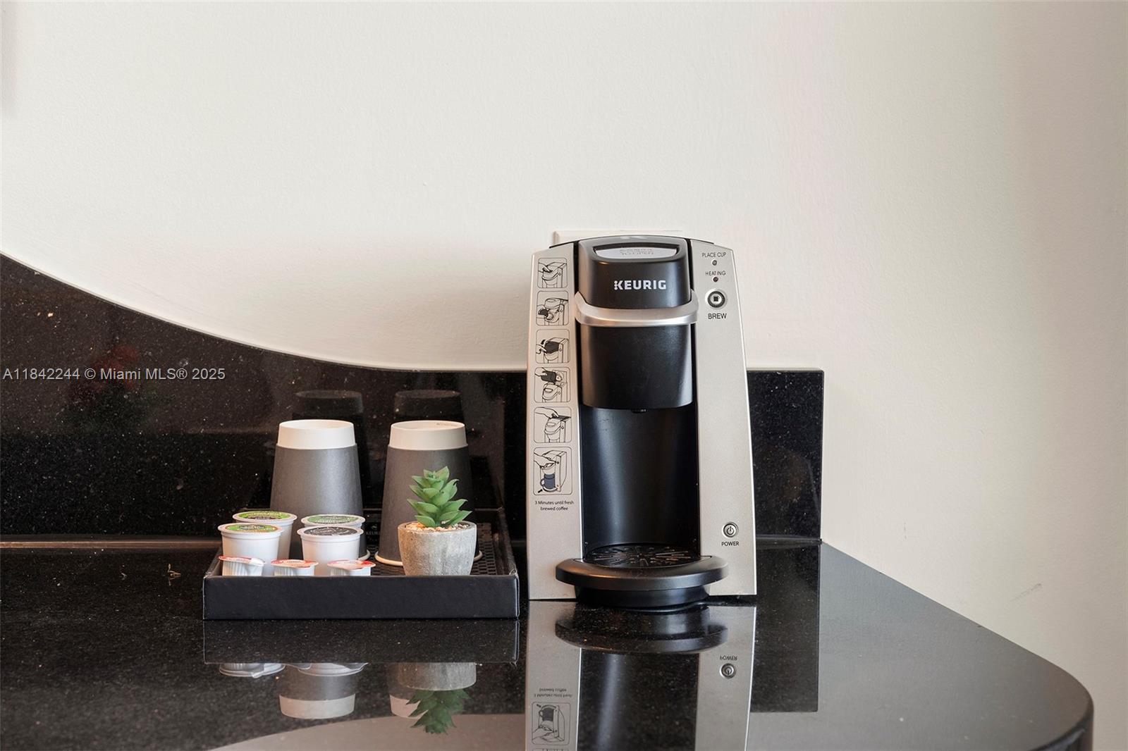 4391 Collins Avenue, Unit 802 Miami Beach, FL 33140 - Photo 17 of 39 a living room with furniture