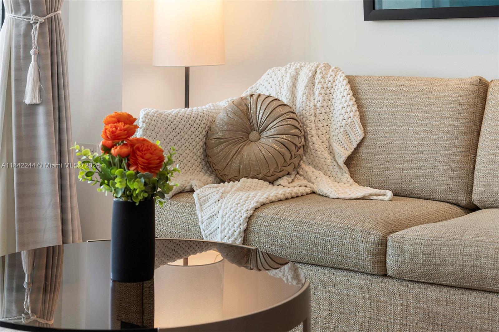 4391 Collins Avenue, Unit 802 Miami Beach, FL 33140 - Photo 10 of 39 a bedroom with a bed and a potted plant