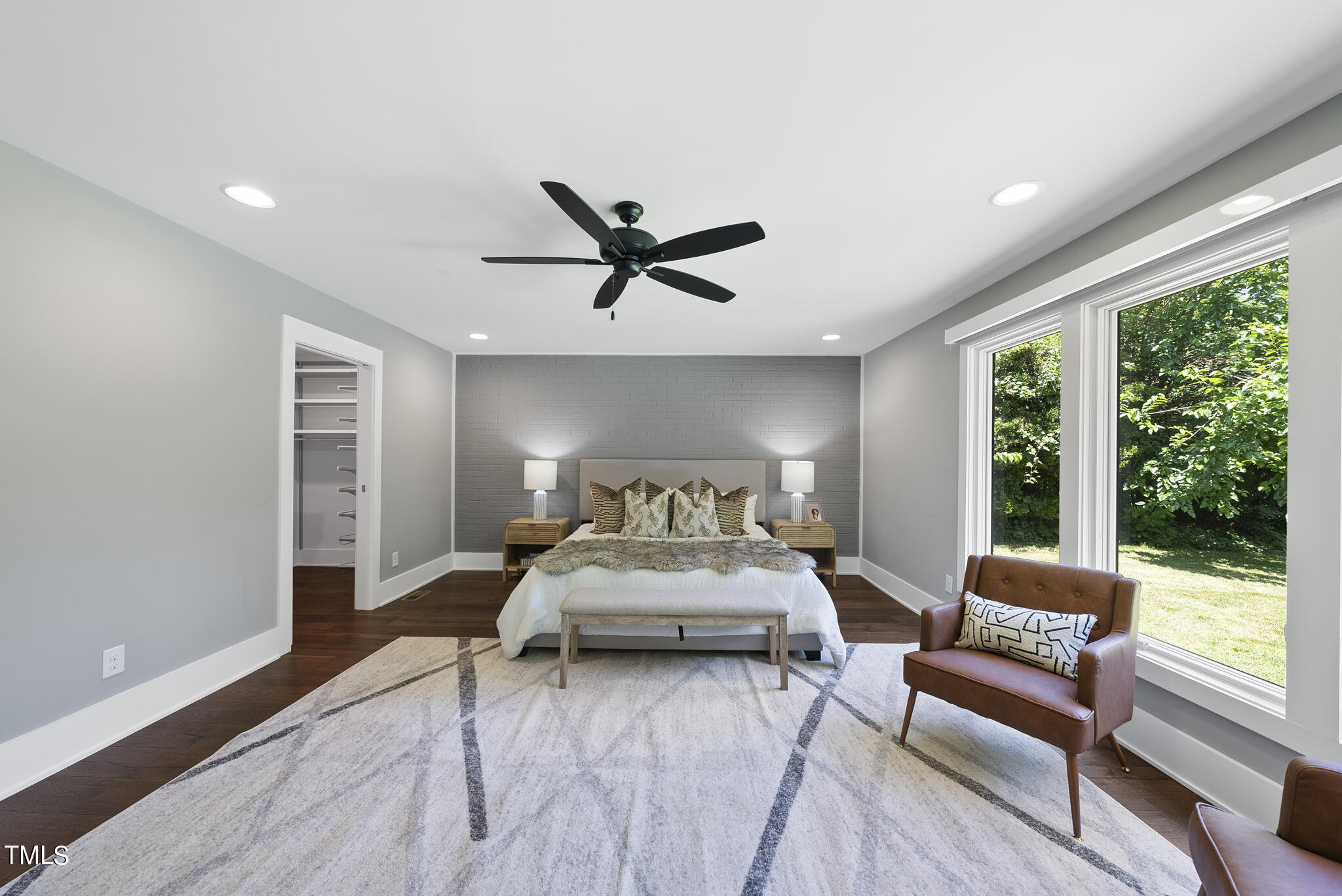 3122 Ashel Street Raleigh, NC 27612 - Photo 21 of 39 a bedroom with a bed and a large window