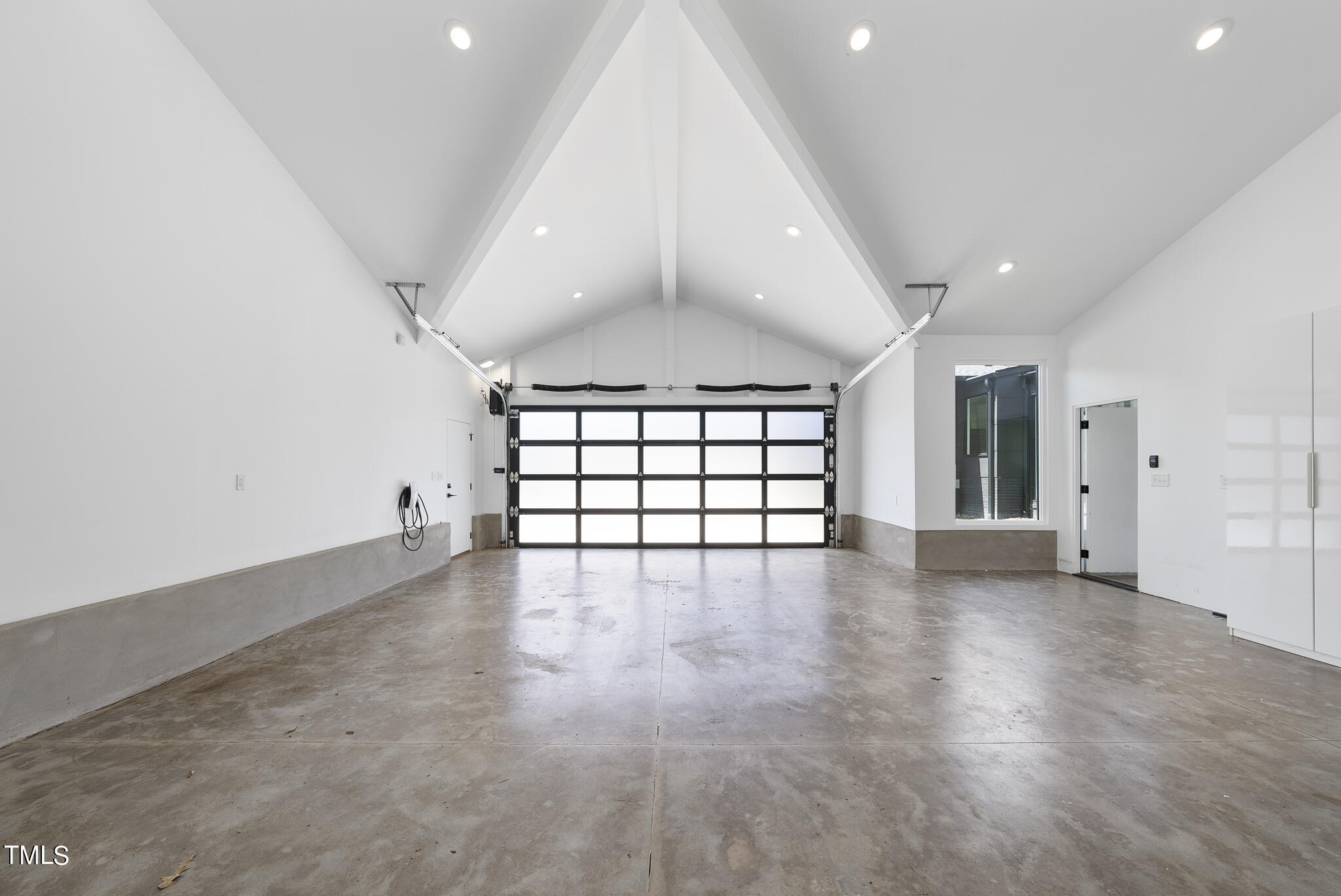 3122 Ashel Street Raleigh, NC 27612 - Photo 30 of 39 an empty room with windows and ceiling fan